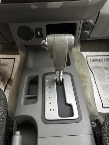 Photo of 2015 Lava Red Nissan Frontier
