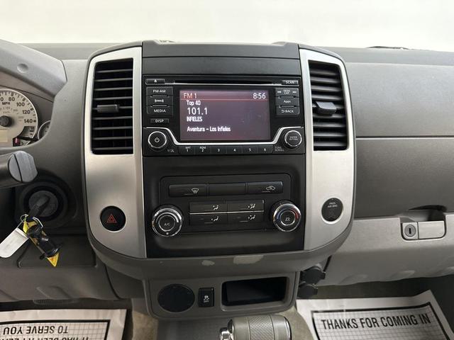 Photo of 2015 Lava Red Nissan Frontier