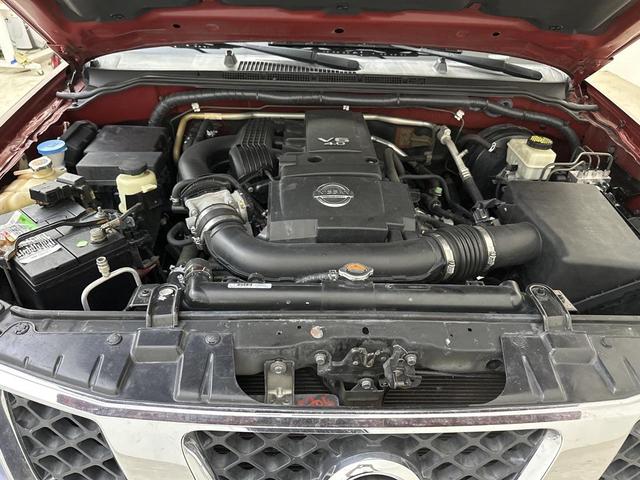 Photo of 2015 Lava Red Nissan Frontier