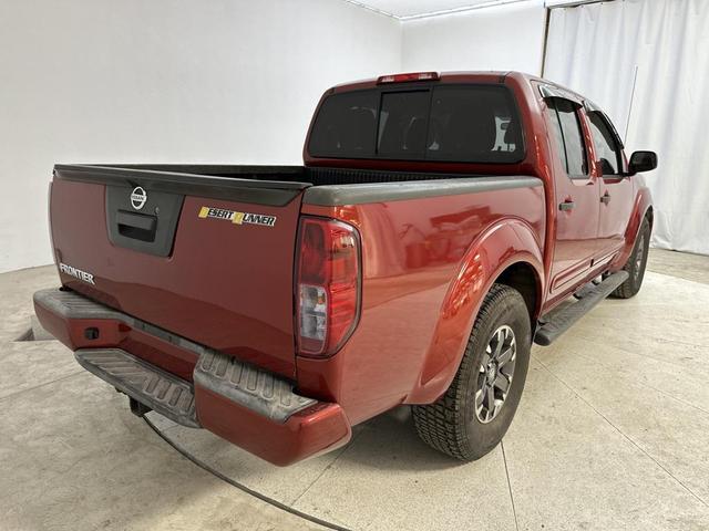 Photo of 2015 Lava Red Nissan Frontier