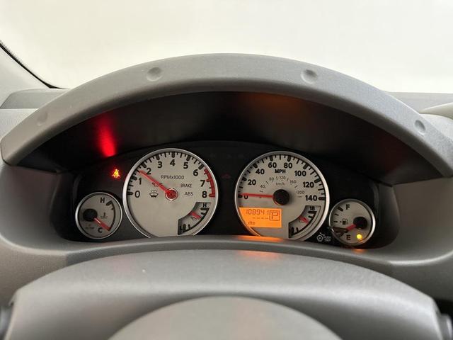 Photo of 2015 Lava Red Nissan Frontier