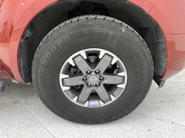 Photo of 2015 Lava Red Nissan Frontier
