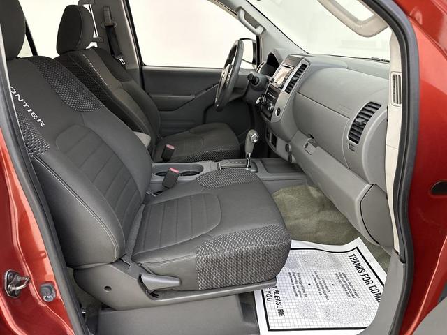 Photo of 2015 Lava Red Nissan Frontier