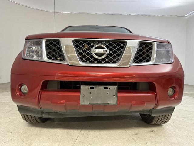 Photo of 2015 Lava Red Nissan Frontier