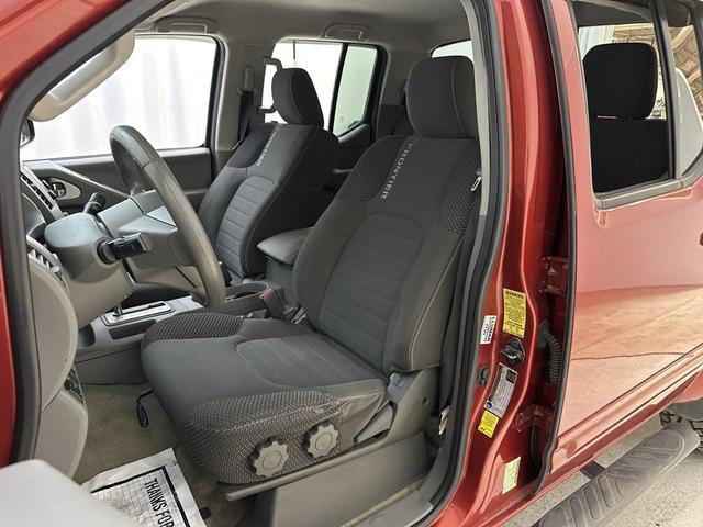 Photo of 2015 Lava Red Nissan Frontier