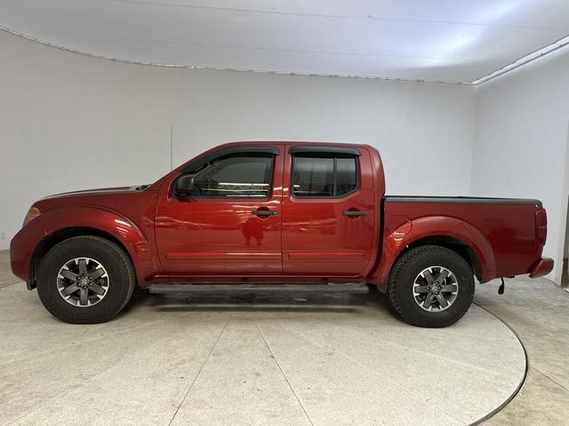 Photo of 2015 Lava Red Nissan Frontier