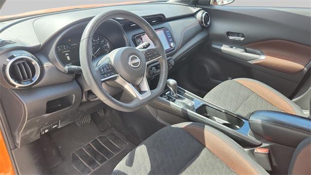 Photo of 2023 Monarch Orange Metallic/Super Black Nissan Kicks