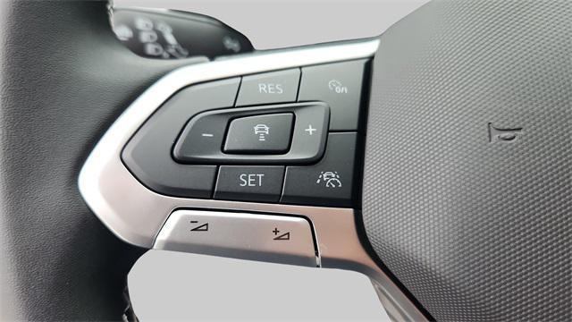 Photo of 2025 Deep Black Pearl Volkswagen Taos