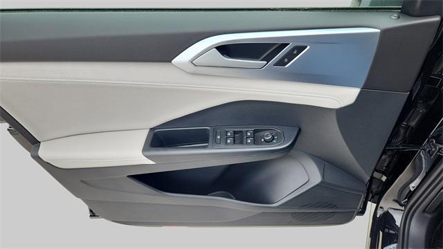 Photo of 2025 Deep Black Pearl Volkswagen Taos