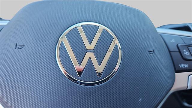 Photo of 2025 Deep Black Pearl Volkswagen Tiguan