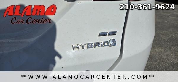 Photo of 2015 White Ford Fusion Hybrid