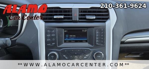 Photo of 2015 White Ford Fusion Hybrid