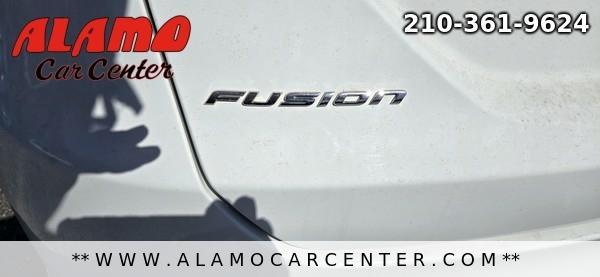 Photo of 2015 White Ford Fusion Hybrid