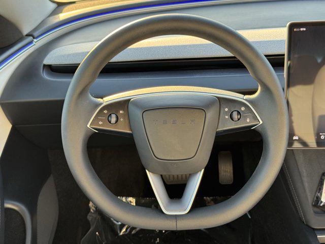 Photo of 2025 Black Tesla Model 3