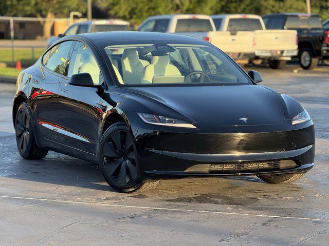 Photo of 2025 Black Tesla Model 3