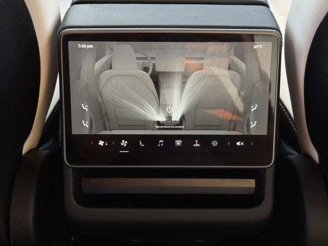 Photo of 2025 Black Tesla Model 3