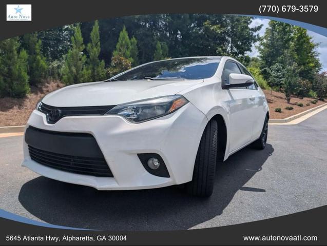 Photo of 2016 Super White Toyota Corolla