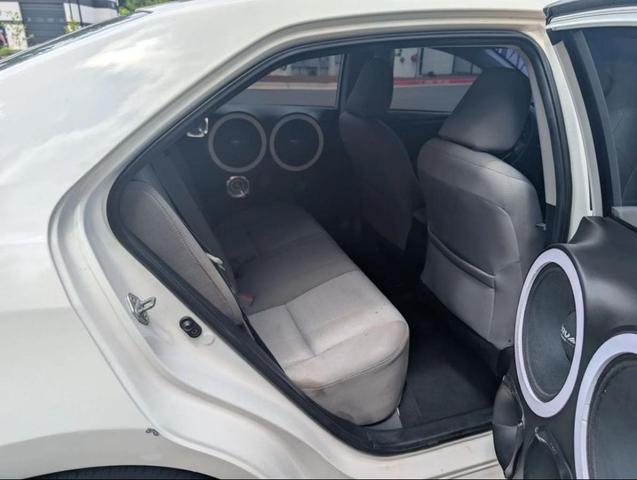 Photo of 2016 Super White Toyota Corolla