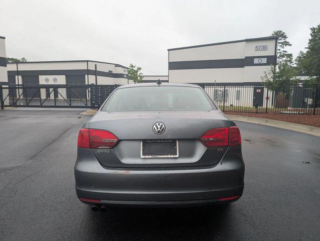 Photo of 2014 Tempest Blue Metallic Volkswagen Jetta