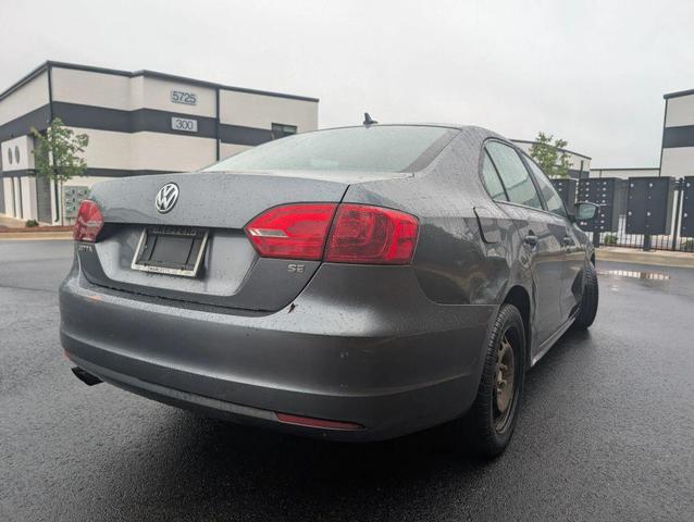 Photo of 2014 Tempest Blue Metallic Volkswagen Jetta