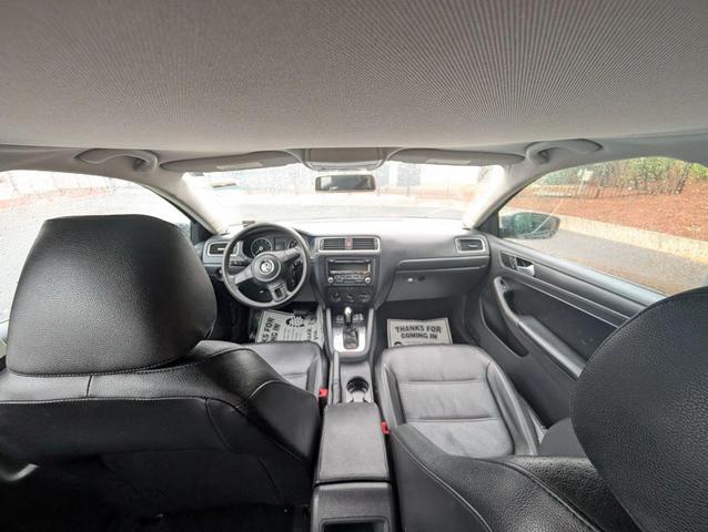 Photo of 2014 Tempest Blue Metallic Volkswagen Jetta