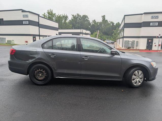 Photo of 2014 Tempest Blue Metallic Volkswagen Jetta