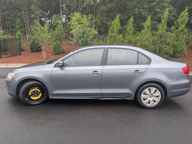 Photo of 2014 Tempest Blue Metallic Volkswagen Jetta