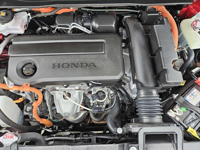 Photo of 2025 Radiant Red Metallic Honda CR-V Hybrid