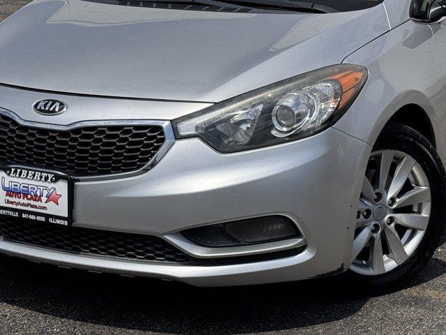 Photo of 2014 Bright Silver Kia Forte