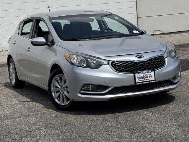 Photo of 2014 Bright Silver Kia Forte