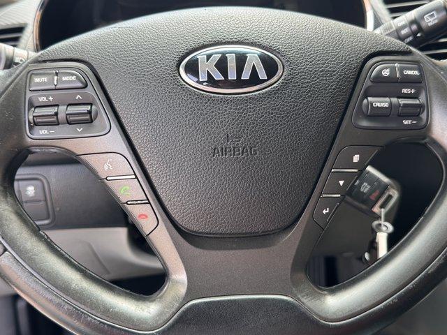 Photo of 2014 Bright Silver Kia Forte