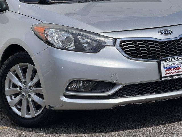 Photo of 2014 Bright Silver Kia Forte