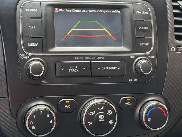 Photo of 2014 Bright Silver Kia Forte