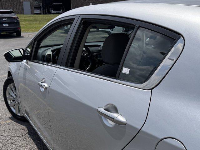 Photo of 2014 Bright Silver Kia Forte