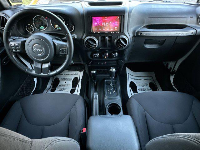 Photo of 2018 Bright White Clearcoat Jeep Wrangler JK