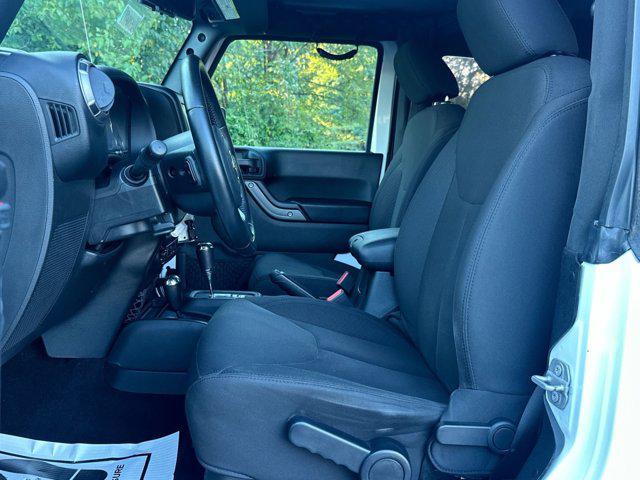 Photo of 2018 Bright White Clearcoat Jeep Wrangler JK