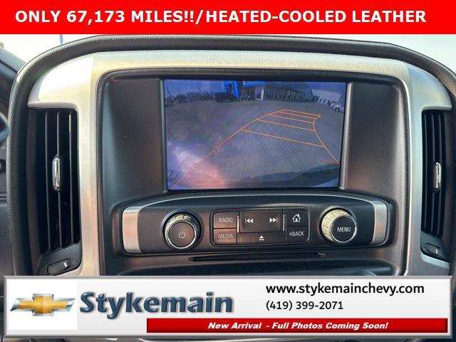 Photo of 2014 Fire Red GMC Sierra 1500
