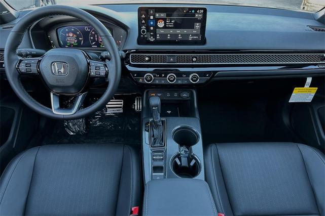 Photo of 2025 Platinum White Pearl Honda Civic Hybrid