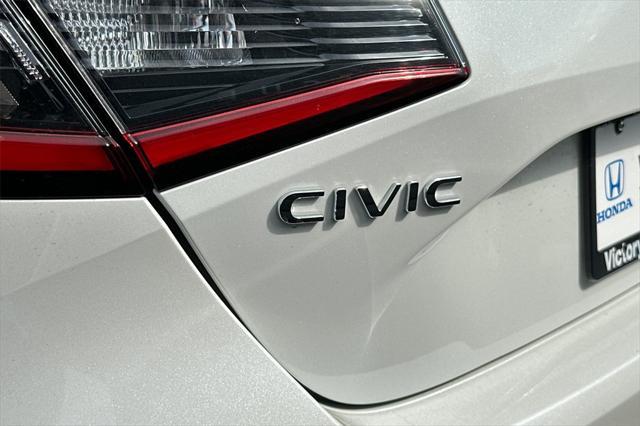 Photo of 2024 Platinum White Pearl Honda Civic