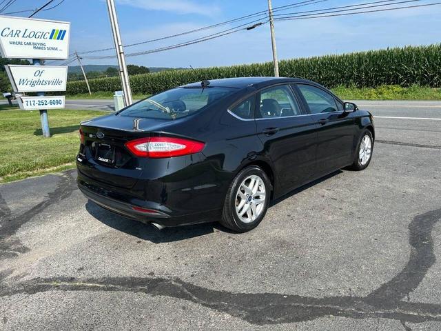 Photo of 2014 Tuxedo Black Metallic Ford Fusion
