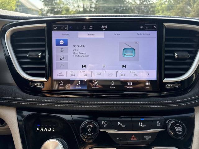 Photo of 2023 Burgundy Chrysler Pacifica Hybrid