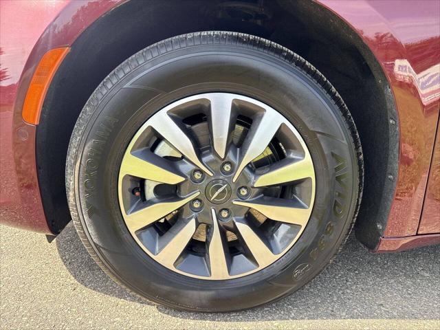Photo of 2023 Burgundy Chrysler Pacifica Hybrid