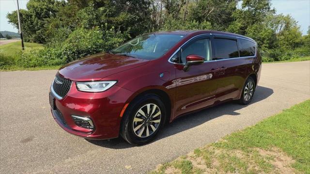 Photo of 2023 Burgundy Chrysler Pacifica Hybrid