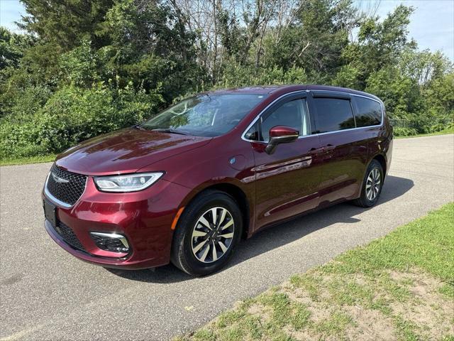 Photo of 2023 Burgundy Chrysler Pacifica Hybrid