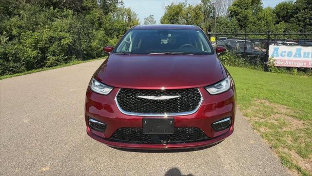 Photo of 2023 Burgundy Chrysler Pacifica Hybrid