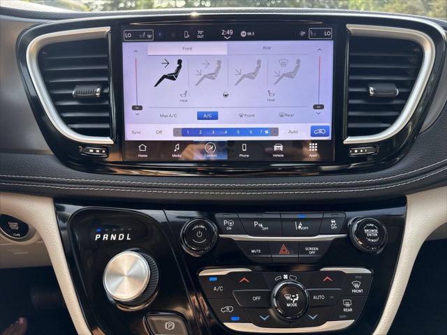 Photo of 2023 Burgundy Chrysler Pacifica Hybrid