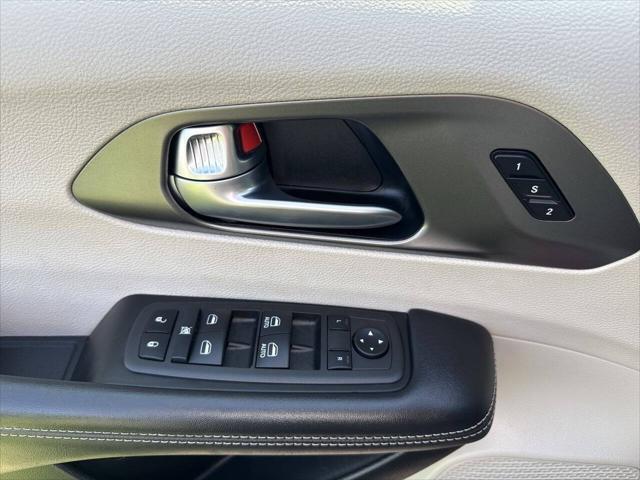 Photo of 2023 Burgundy Chrysler Pacifica Hybrid