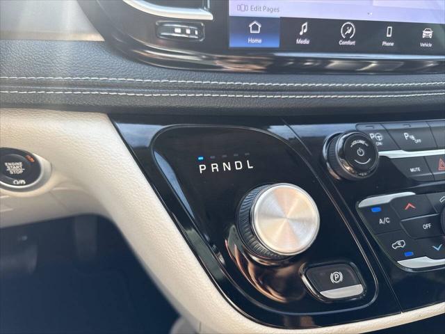 Photo of 2023 Burgundy Chrysler Pacifica Hybrid