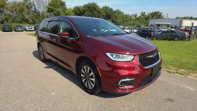 Photo of 2023 Burgundy Chrysler Pacifica Hybrid