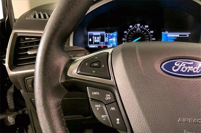 Photo of 2024 Agate Black Metal Ford Edge